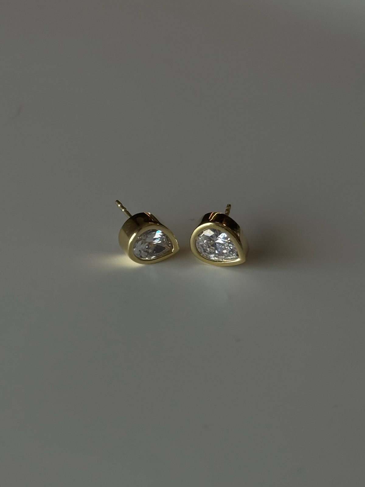 THE PEAR BEZEL STUDS